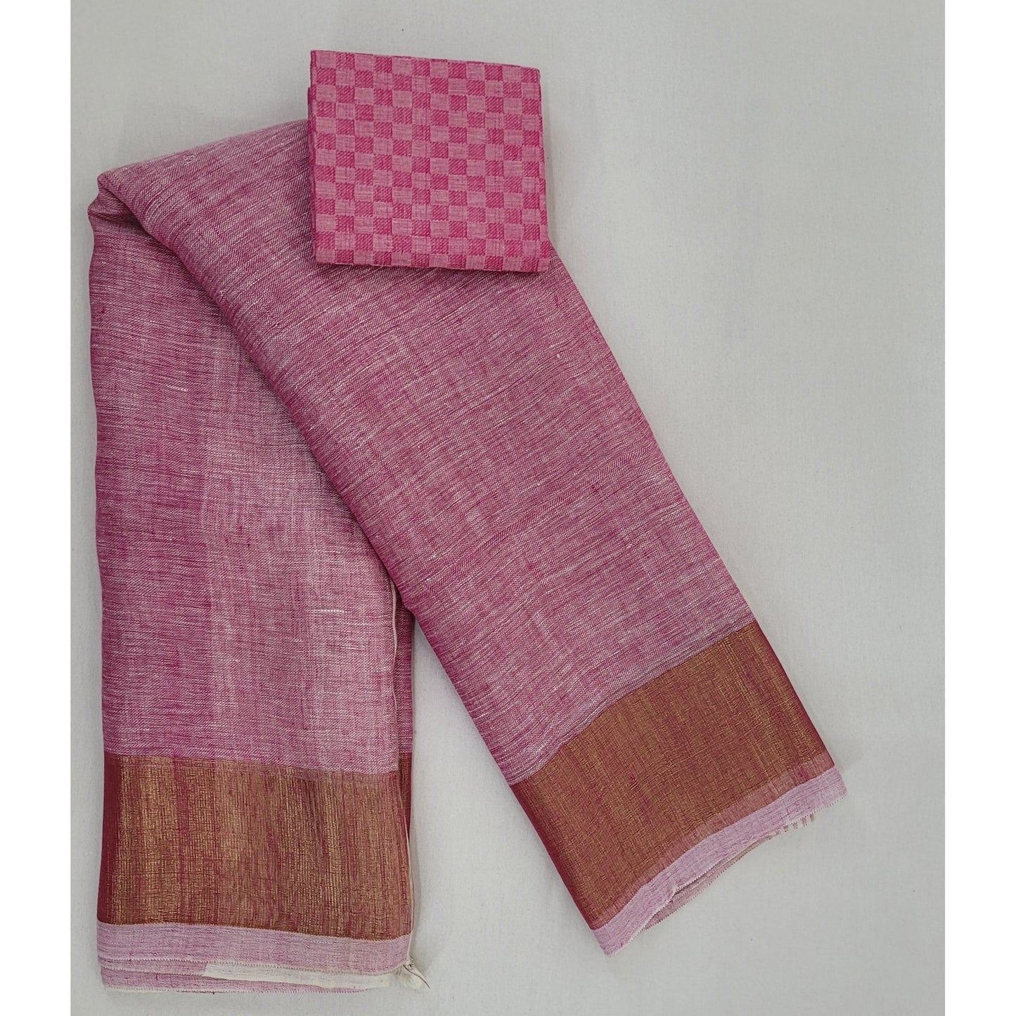 Premium Handwoven Linen pink with golden zari border saree - Vinshika