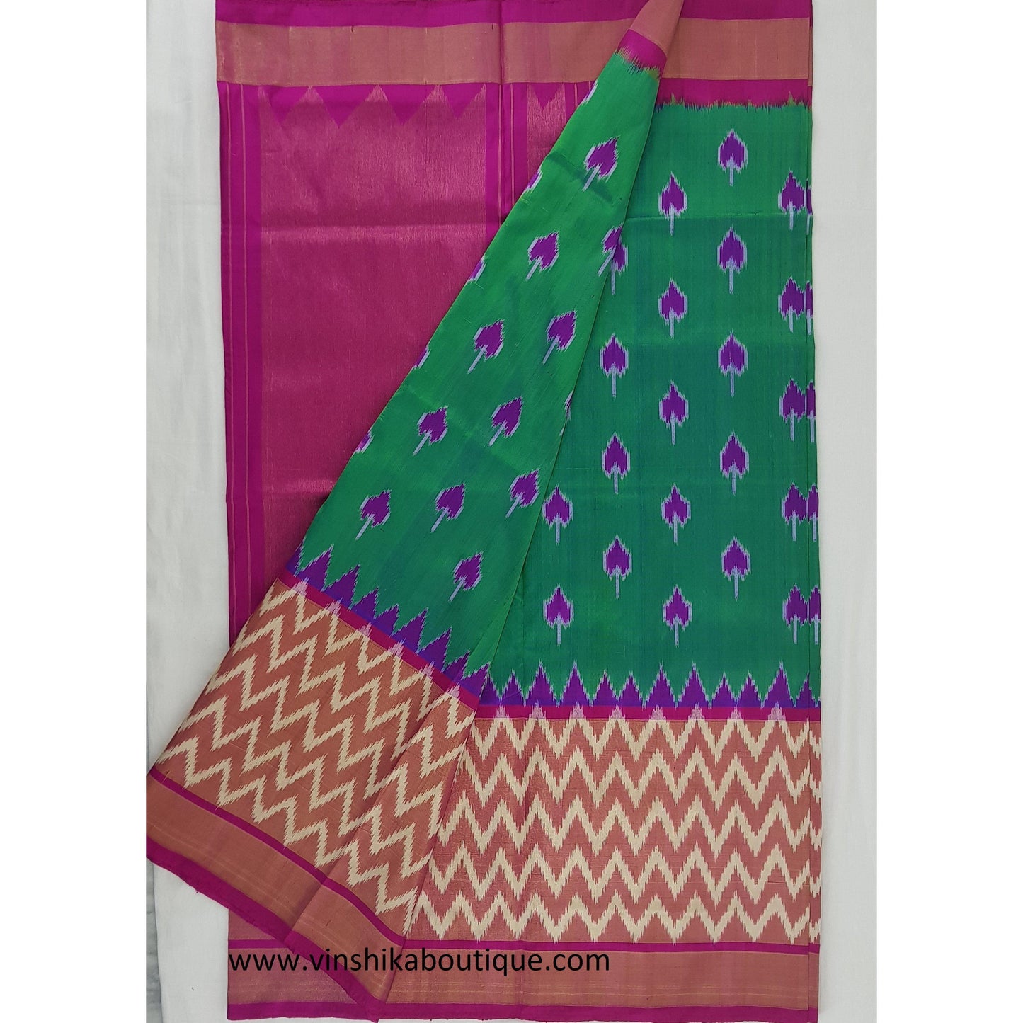 Ikat green and pink color handwoven silk saree - Vinshika