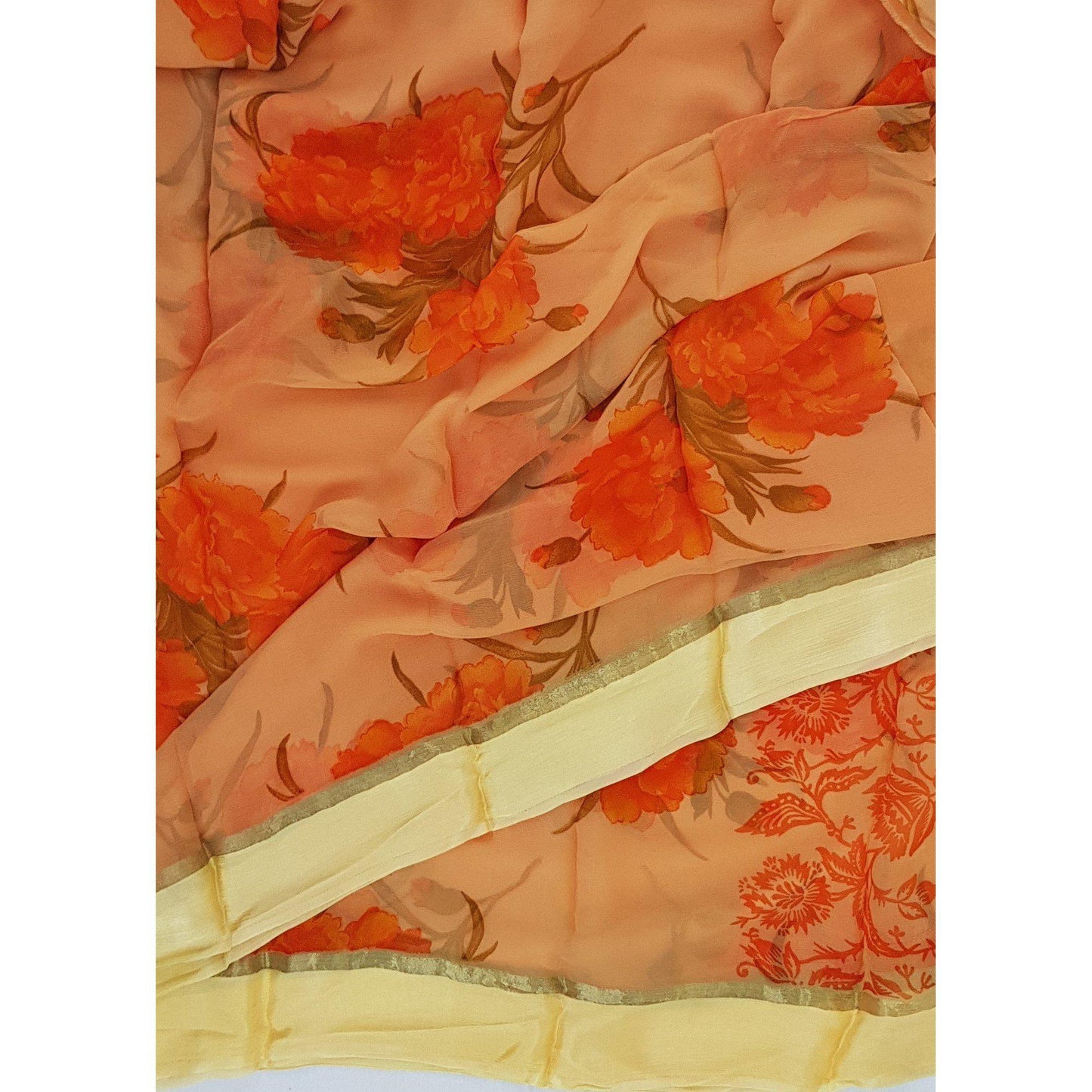 Saffron color floral chiffon saree with satin border - Vinshika